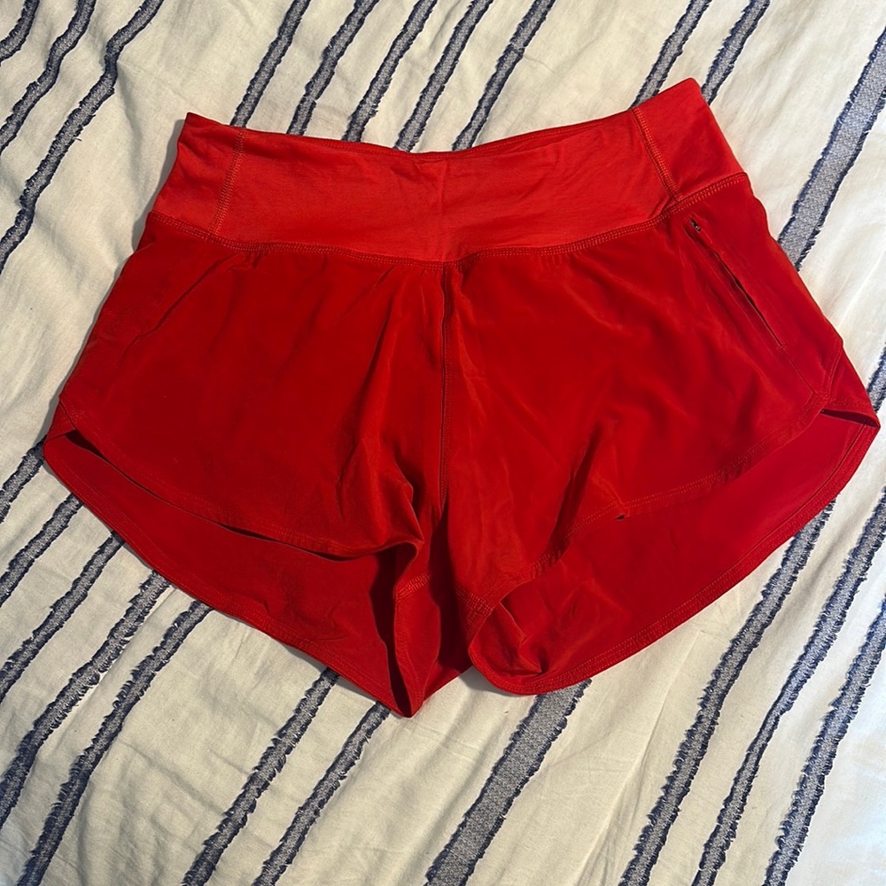 NWOT. Outdoor Voices red running shorts